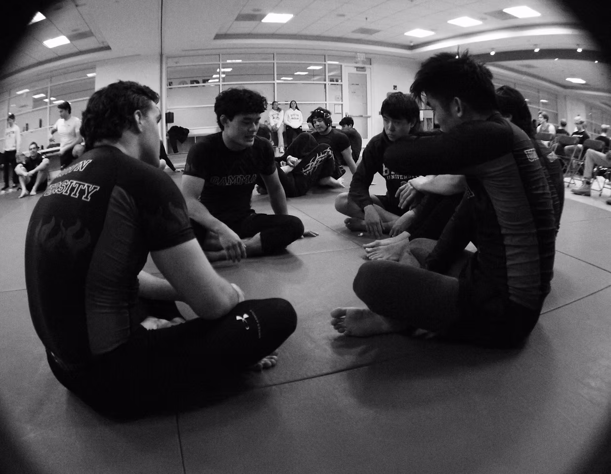 Collegiate jiu-jitsu athletes competing